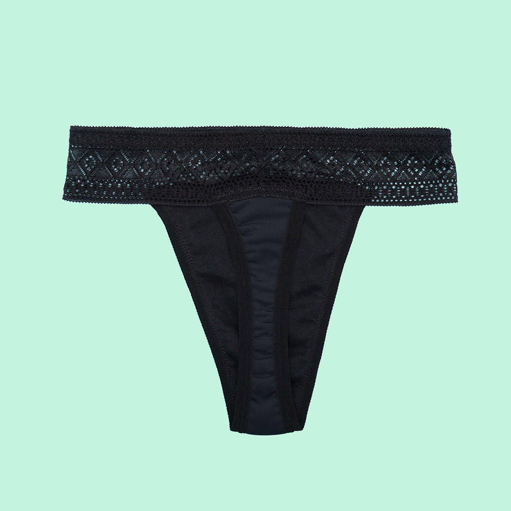 Tanga menstrual absorbente clásica negra dorso | emes
